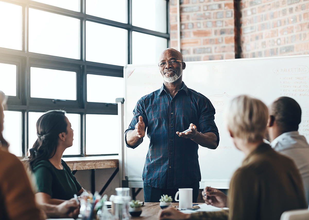 Marketing leader presenting a go-to-market plan to a team