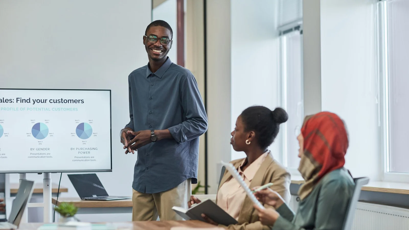 Marketing team reviewing business analytics during a presentation