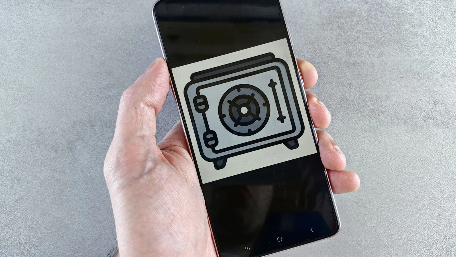 Smartphone displaying a digital security symbol